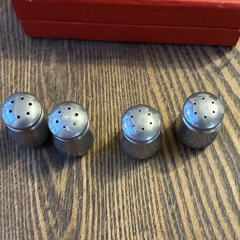 4 Salt and Pepper Shakers in Original Box pre owned silver colored